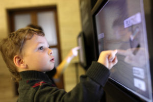 Child using a touchscreen device