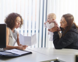 Mom and Nanny revieiwng nanny contract together