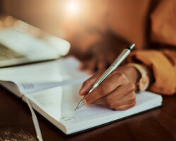 Family Assistant planning summer schedules, appointments, and household logistics in a daily planner.