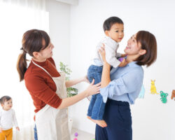 Mother with children talking to a ROTA Nanny